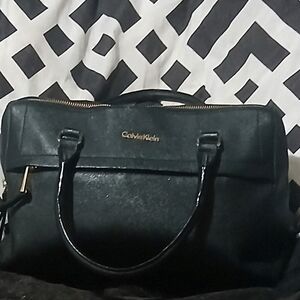 Calvin Klein Black Travel Bag with Gold Accents